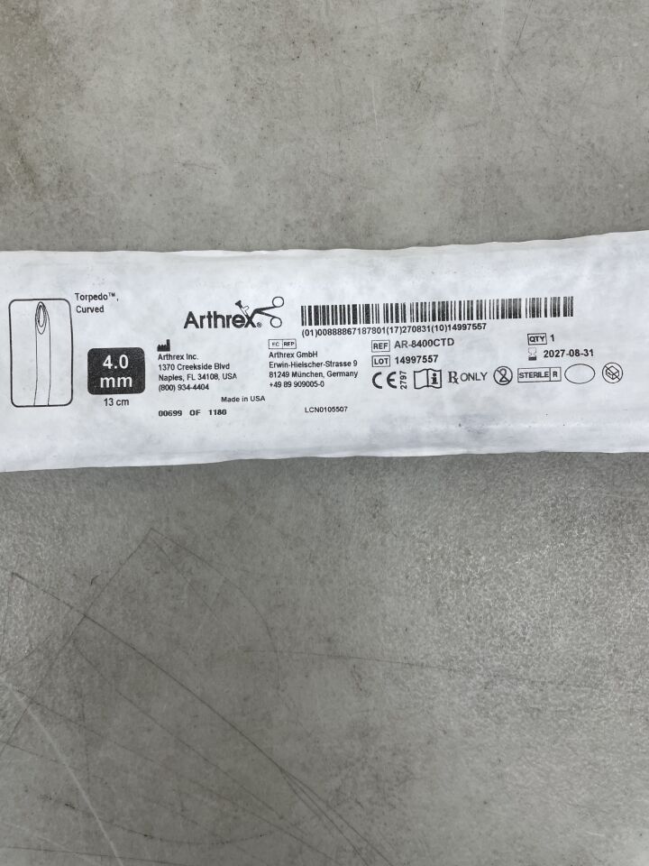 Arthrex Torpedo Curved 4.0mm surgical instrument sterile packaging on gray surface