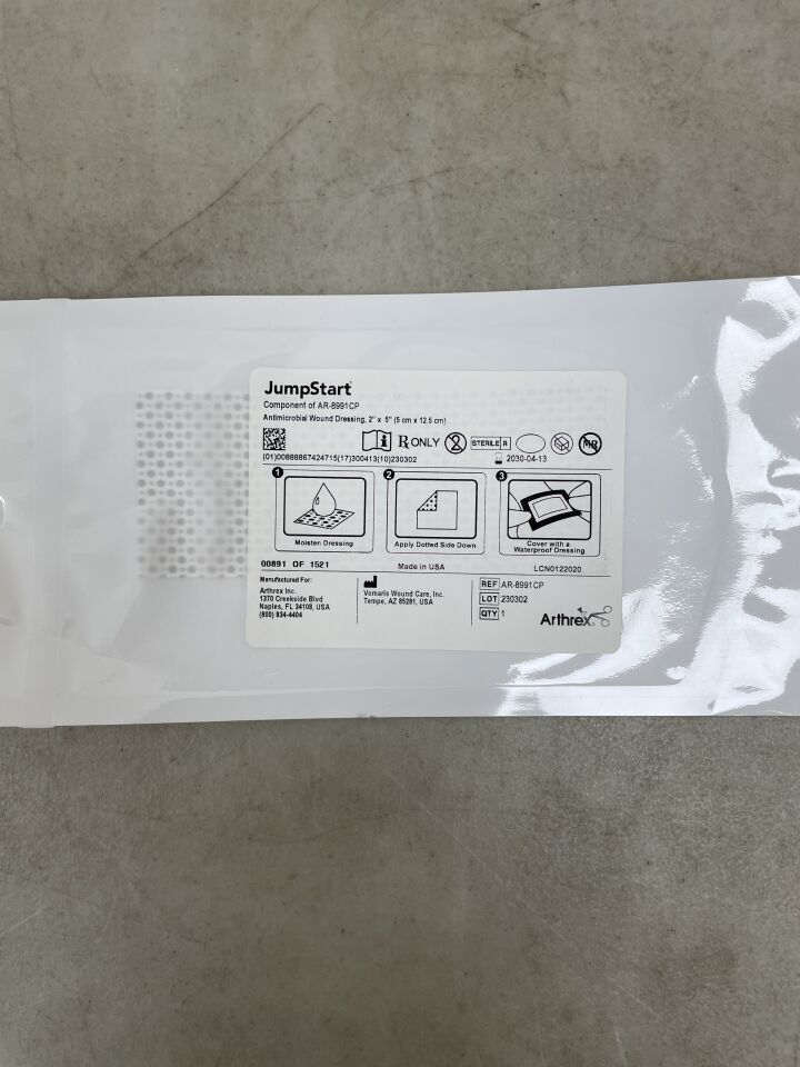 JumpStart antimicrobial wound dressing sterile medical packaging on gray surface