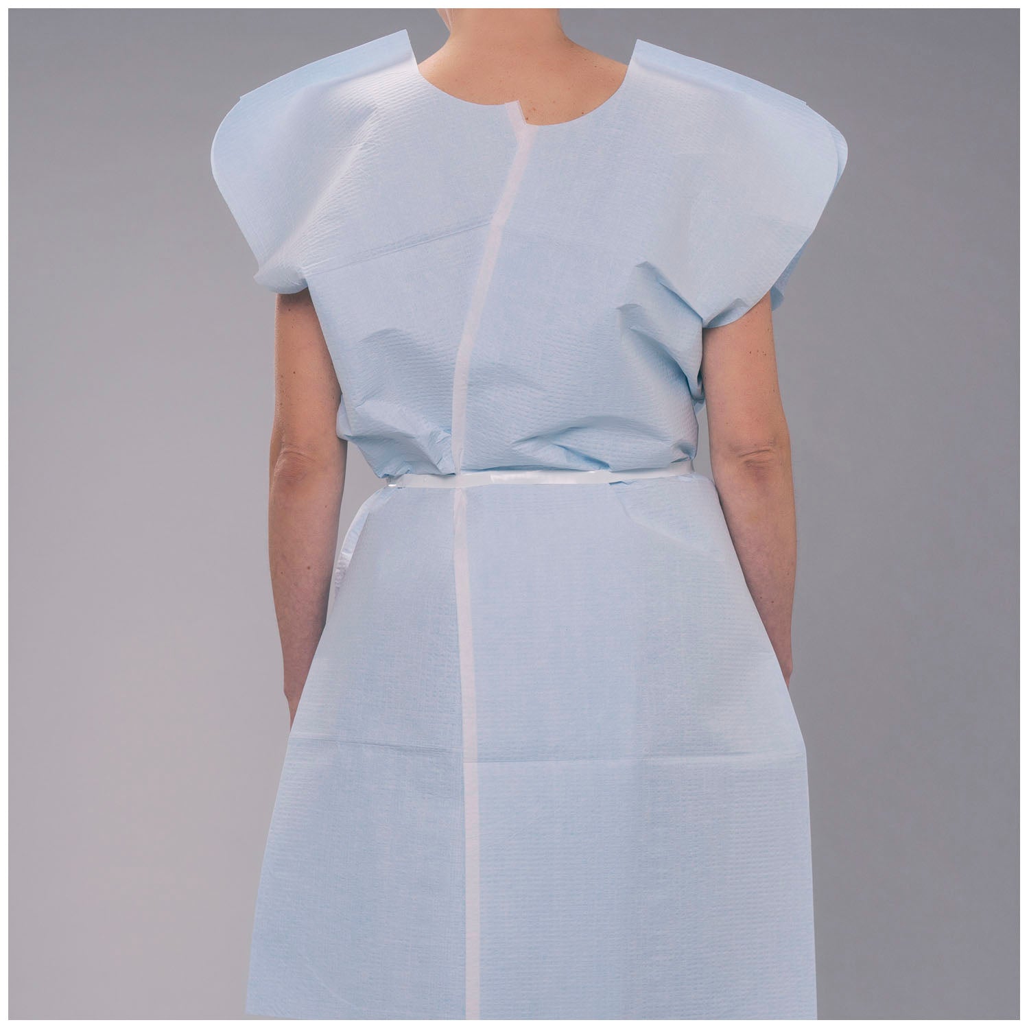 910520 - TIDI Products, LLC - Bata de examen, 30" x 42", para adultos, azul, T/P/T, abertura delantera o trasera, 50/caja